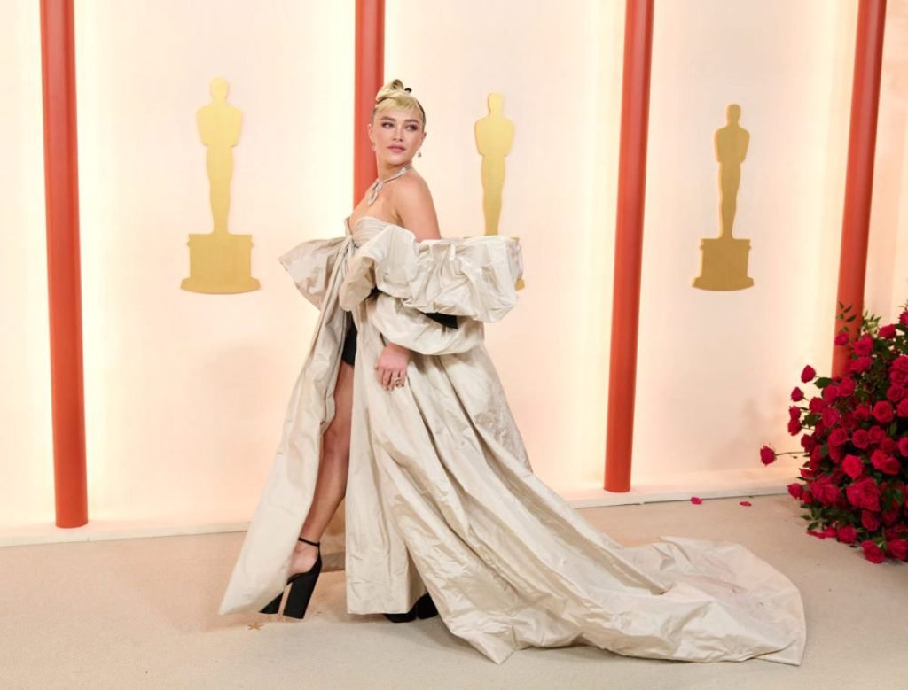 Florence Pugh in Valentino haute couture and Tiffany & Co at Style Chronicles: The Most Memorable Moments from the Oscar 2023 Red Carpet
